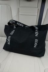 EDÉN SIGNATURE STRAP TOTE BAG